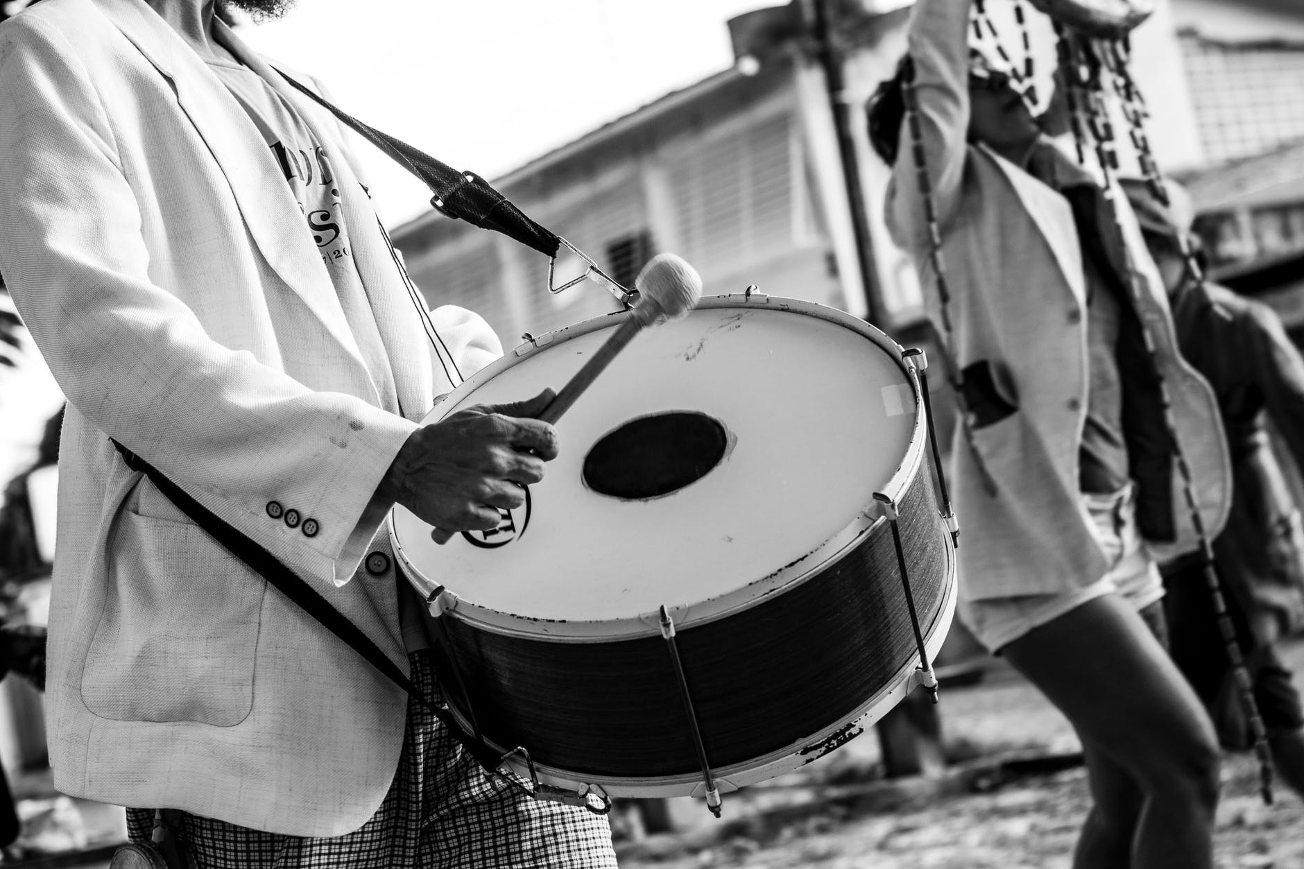 person holding drum